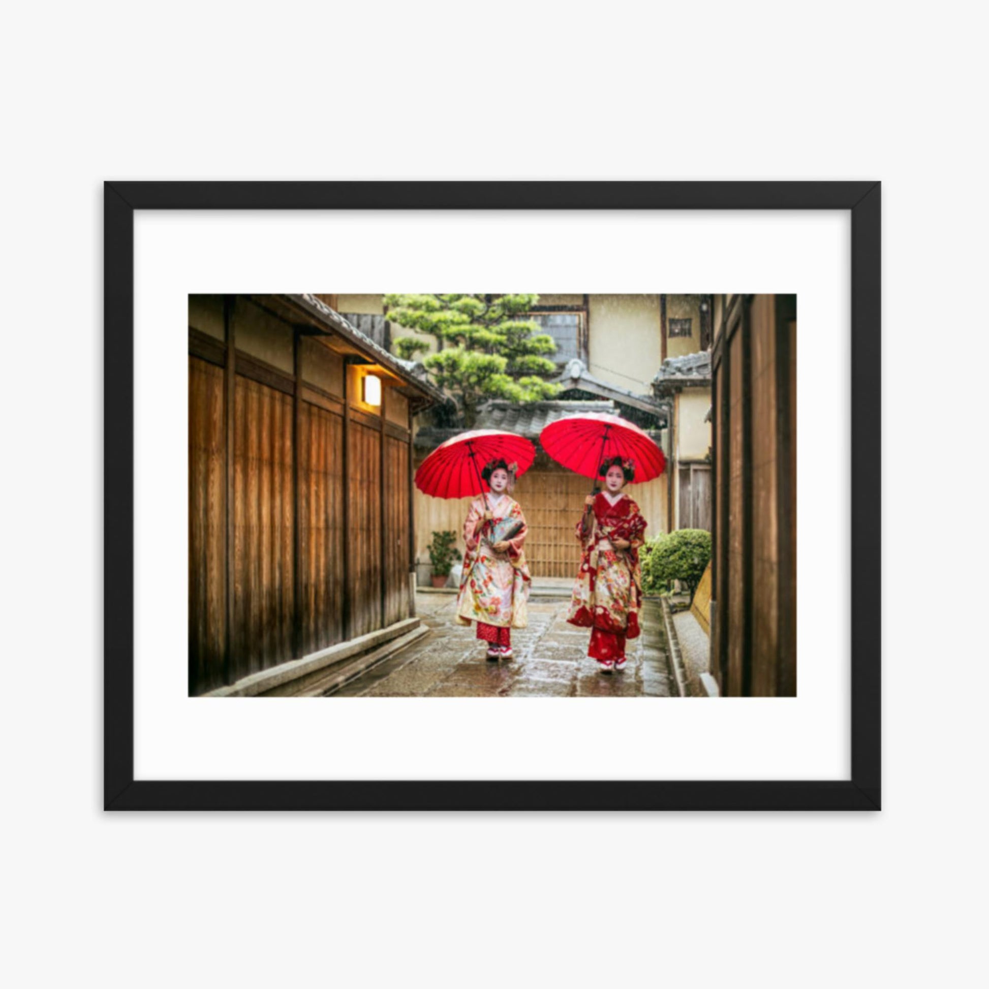 Geishas holding red umbrellas during rainy season 16x20 in Poster With Black Frame