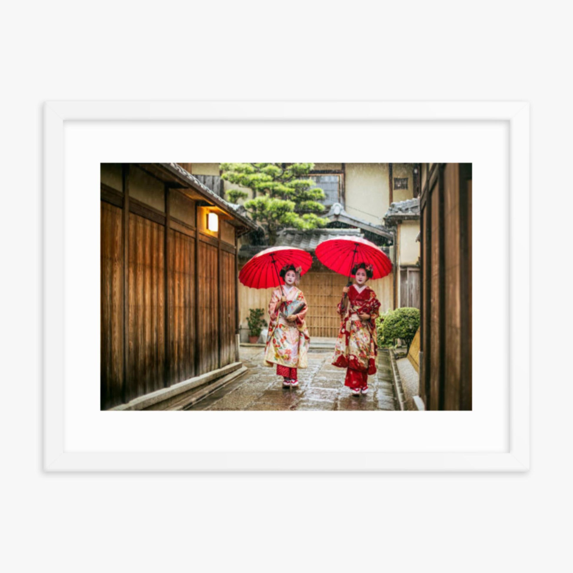 Geishas holding red umbrellas during rainy season 18x24 in Poster With White Frame