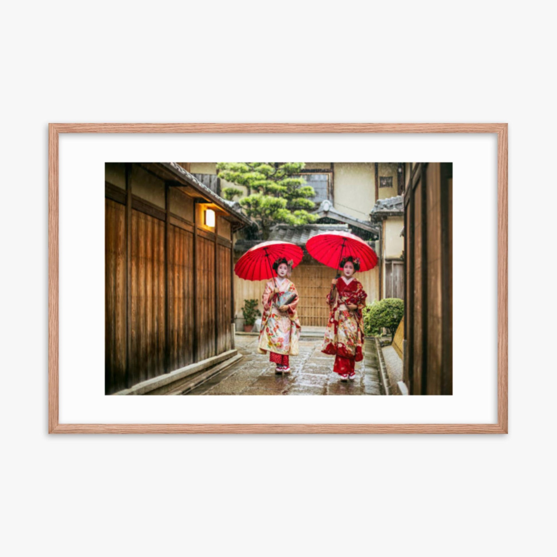 Geishas holding red umbrellas during rainy season 24x36 in Poster With Oak Frame