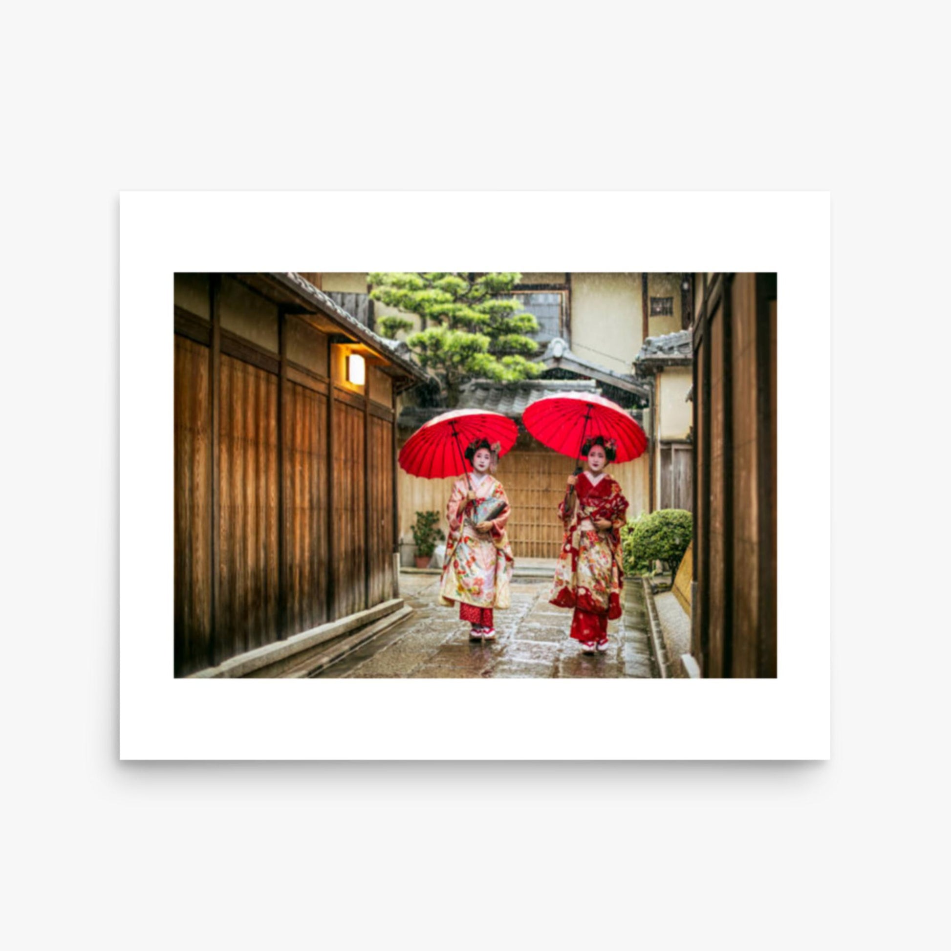 Geishas holding red umbrellas during rainy season 16x20 in Poster