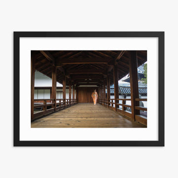 Woman in a kimono walking through a temple corridor 18x24 in Poster With Black Frame